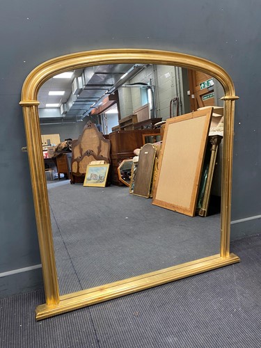 Lot 690 - A gilt arched overmantel mirror, 122cm x 120cm