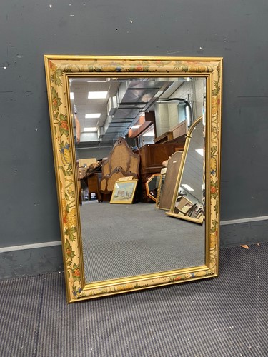 Lot 443 - A floral painted rectangular wall mirror, 89cm...