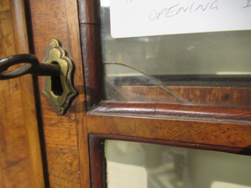 Lot 465 - A walnut bureau bookcase, 18th century