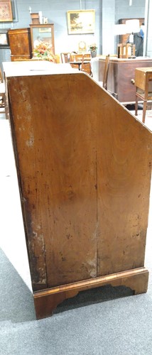 Lot 310 - A walnut bureau, early 18th century