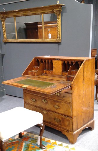 Lot 310 - A walnut bureau, early 18th century
