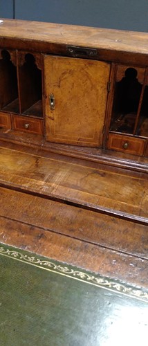 Lot 310 - A walnut bureau, early 18th century