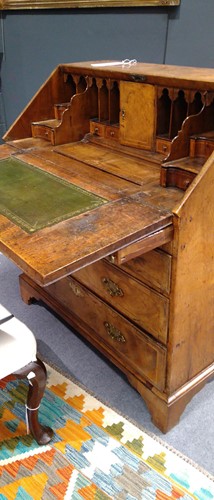 Lot 310 - A walnut bureau, early 18th century