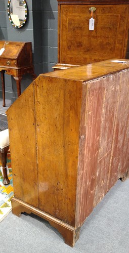 Lot 310 - A walnut bureau, early 18th century