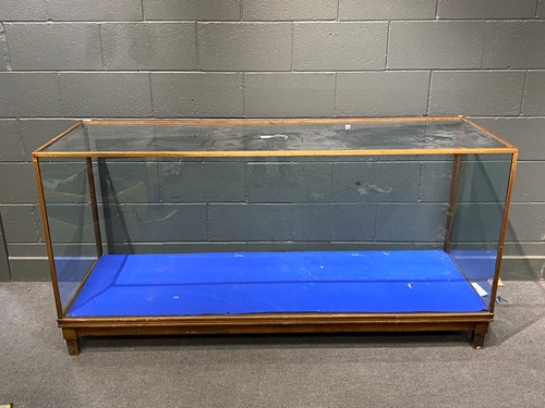 Lot 827 - Two glazed haberdashery retail display units with blue paper lining
