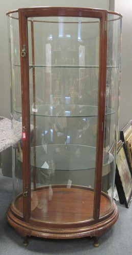 Lot 828 - An oval display cabinet, early 20th century