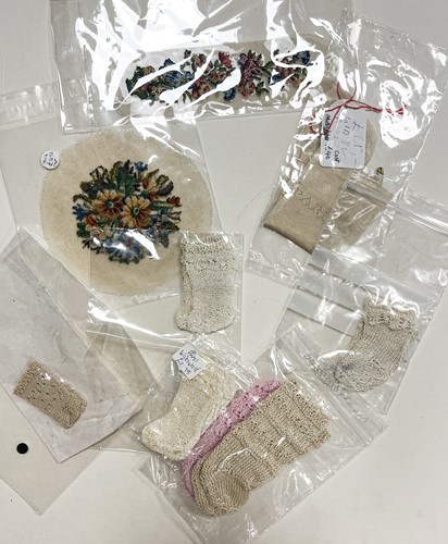 Lot 205 - A quantity of dolls' shoes, socks and gloves
