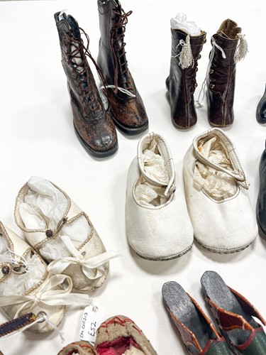 Lot 205 - A quantity of dolls' shoes, socks and gloves