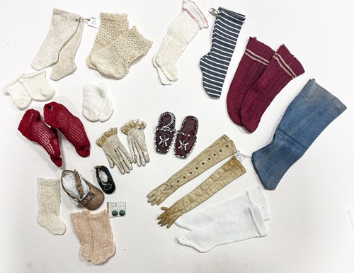 Lot 205 - A quantity of dolls' shoes, socks and gloves