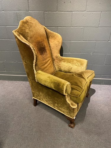 Lot 626 - George II style wingback armchair with high...