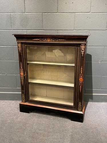Lot 615 - A Victorian ebonised pier cabinet with single...