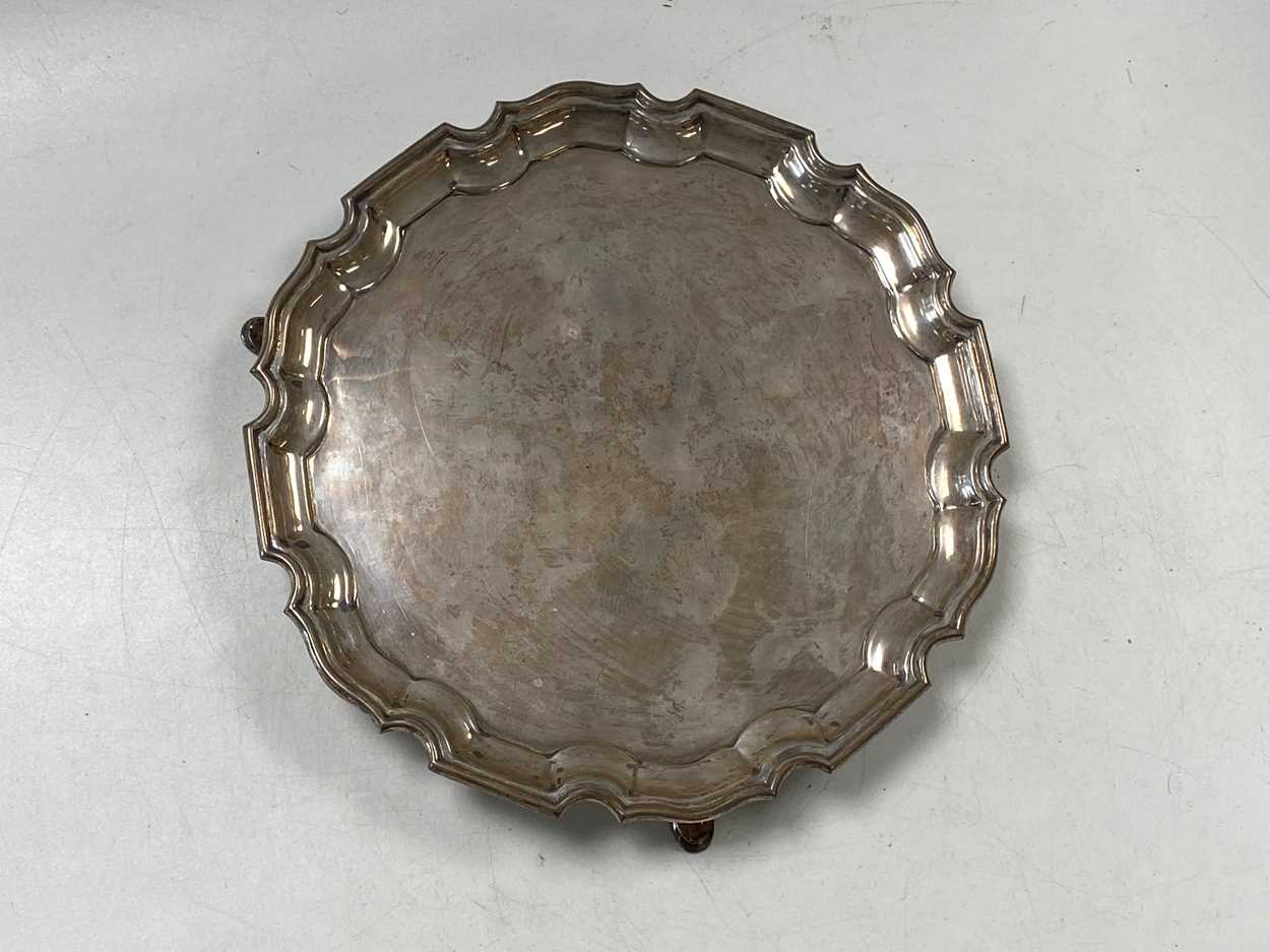 Lot 370 - A silver 'Chippendale' style salver, 307g...