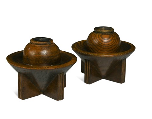 Lot 157 - A pair of Art Deco oak candlesticks by Ebenezer Gomme