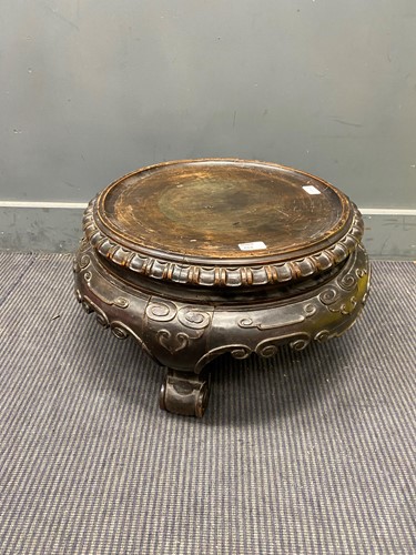 Lot 682 - A large Chinese hard wood stand, 20th century,...