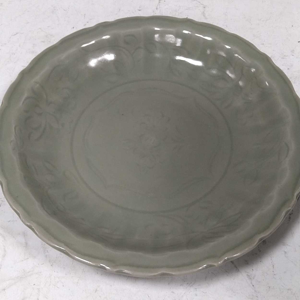 Lot 152 - Longquan celadon dish Song dynasty. Barbed rim...