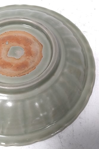 Lot 152 - Longquan celadon dish Song dynasty. Barbed rim...