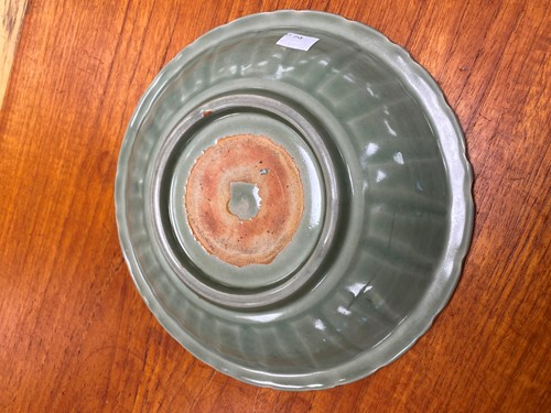 Lot 152 - Longquan celadon dish Song dynasty. Barbed rim...