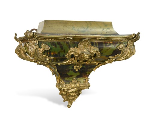 Lot 327 - A French green stained cow-horn and ormolu clock bracket, 18th century