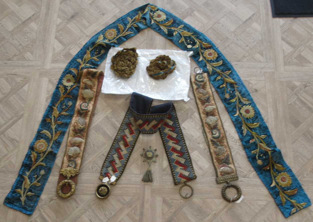Lot 288 - 18th century embroidered sash badge and tassel...