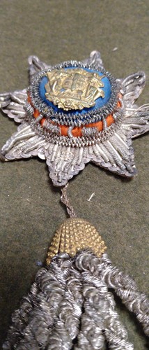 Lot 288 - 18th century embroidered sash badge and tassel...