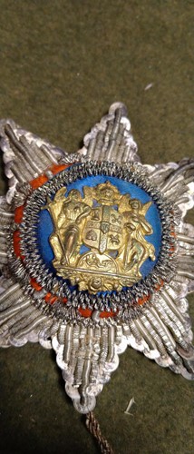 Lot 288 - 18th century embroidered sash badge and tassel...