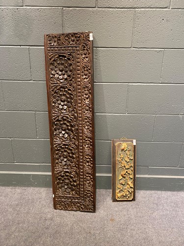 Lot 607 - A 19th century hardwood panel carved with...