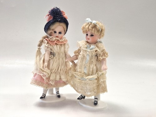 Lot 40 - Two all bisque mignonette dolls, French, early 20th century