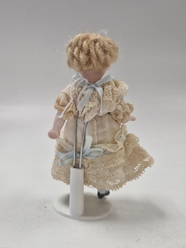 Lot 40 - Two all bisque mignonette dolls, French, early 20th century
