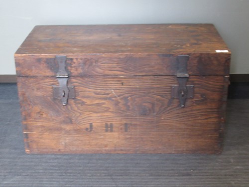 Lot 659 - A early 20th century stained pine trunk...