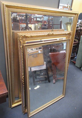 Lot 701 - Four modern gilt framed rectangular wall...