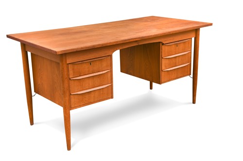 Lot 342 - A mid-century Danish teak desk
