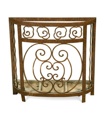 Lot 297 - In the manner of Edgar Brandt (1880-1960), a wrought iron stick stand