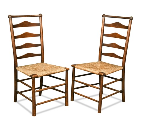 Lot 239 - Attributed to C. R. Ashbee for the Guild of Handicraft, a pair of rush seated ash chairs, circa 1900