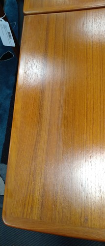 Lot 345 - A mid-century Danish teak extending dining table and six chairs, circa 1960