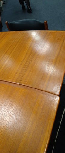 Lot 345 - A mid-century Danish teak extending dining table and six chairs, circa 1960