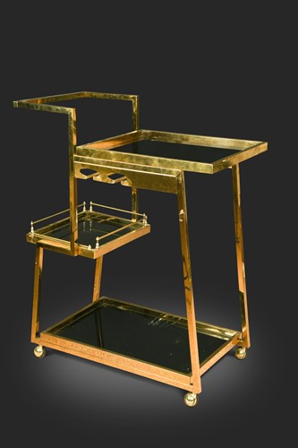 Lot 337 - A brass three tier drinks trolley