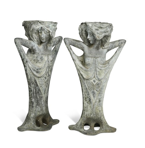 Lot 147 - A pair of Art Nouveau lead vases