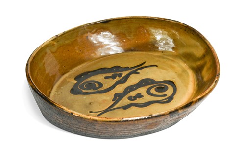 Lot 56 - Charles Tustin (1922-1966) at WInchcombe Pottery, a slipware dish