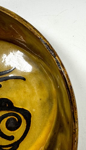 Lot 56 - Charles Tustin (1922-1966) at WInchcombe Pottery, a slipware dish