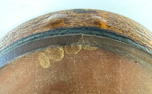 Lot 56 - Charles Tustin (1922-1966) at WInchcombe Pottery, a slipware dish