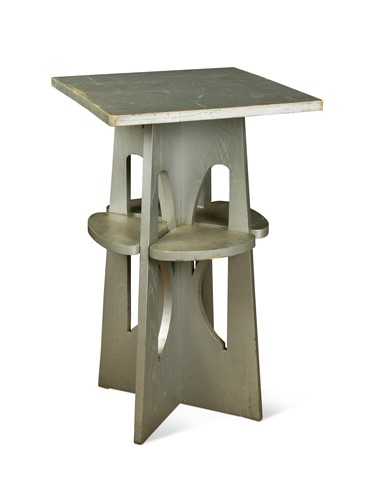 Lot 235 - In the manner of John Ednie, a silver painted oak 'Domino' side table