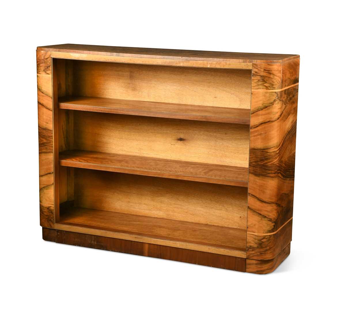 Lot 322 - An Art Deco walnut open book case,