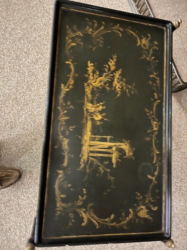 Lot 469 - An Italian black and gilt painted tray on stand