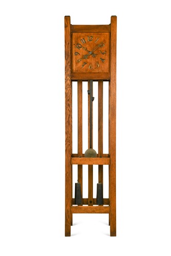 Lot 184 - An Arts & Crafts or American Mission oak longcase clock
