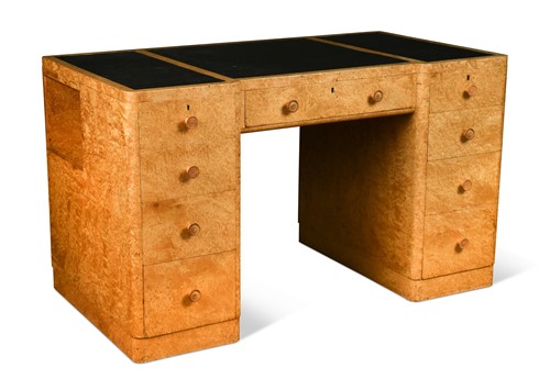 Lot 317 - An Art Deco burr maple leather inset desk
