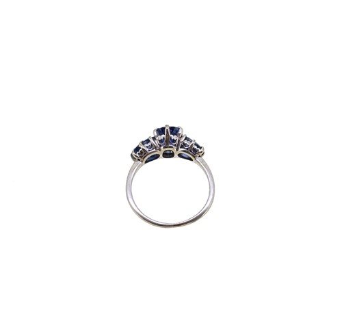 Lot 153 - A three stone Burmese sapphire ring