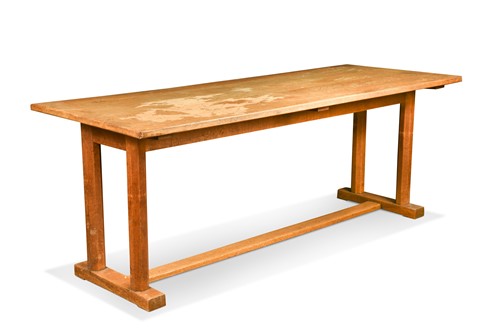 Lot 265 - A Gordon Russell Arts & Crafts oak 'Enstone' trestle dining table