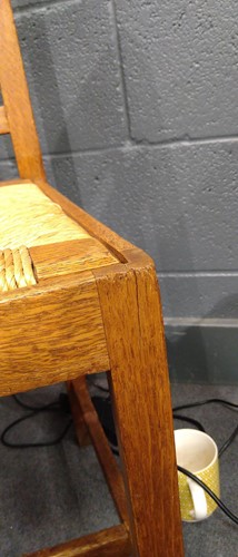 Lot 266 - Paul Matt for Brynmawr Furniture, a set of twelve Arts & Crafts oak 'Mount' dining chairs