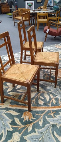 Lot 266 - Paul Matt for Brynmawr Furniture, a set of twelve Arts & Crafts oak 'Mount' dining chairs