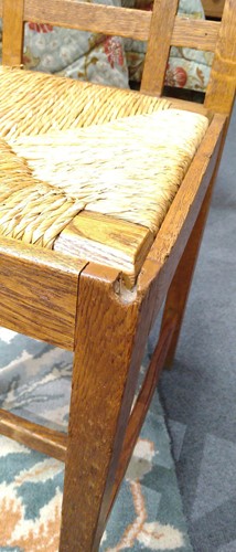 Lot 266 - Paul Matt for Brynmawr Furniture, a set of twelve Arts & Crafts oak 'Mount' dining chairs